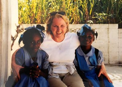 Jo Ann with two school girls