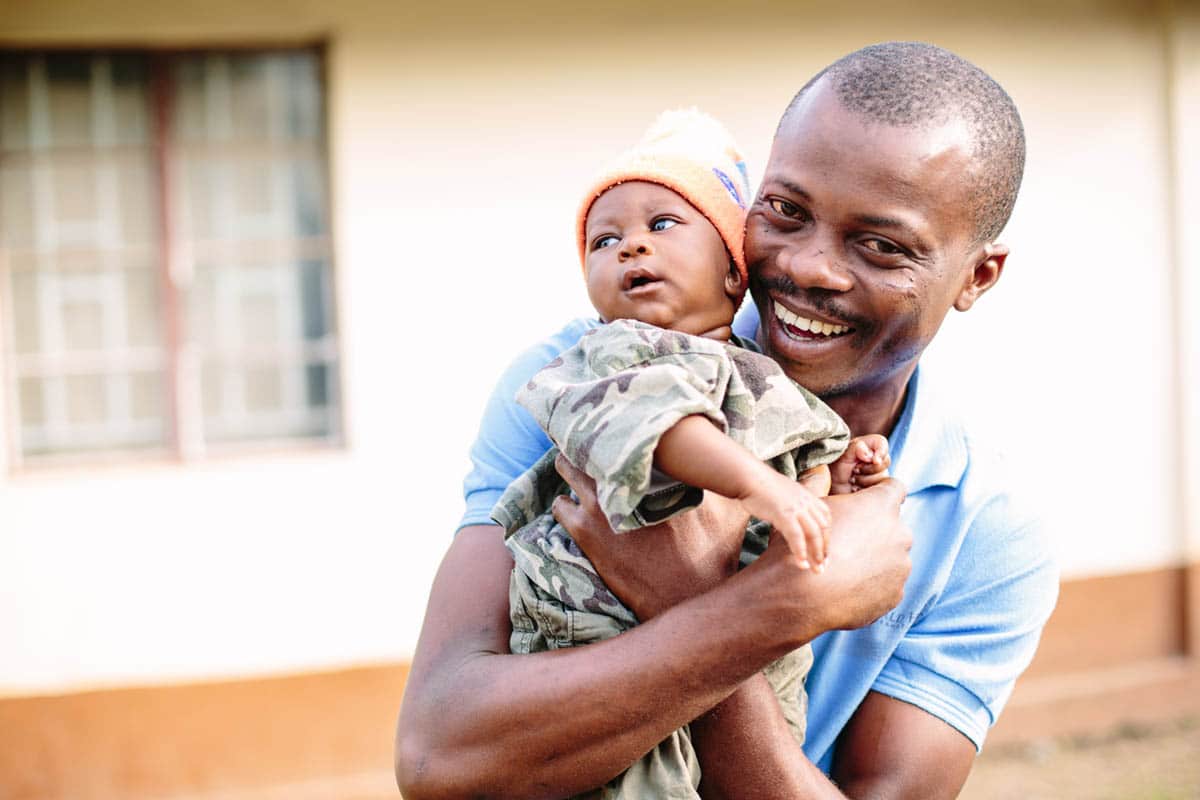 World Hope Volunteer with baby