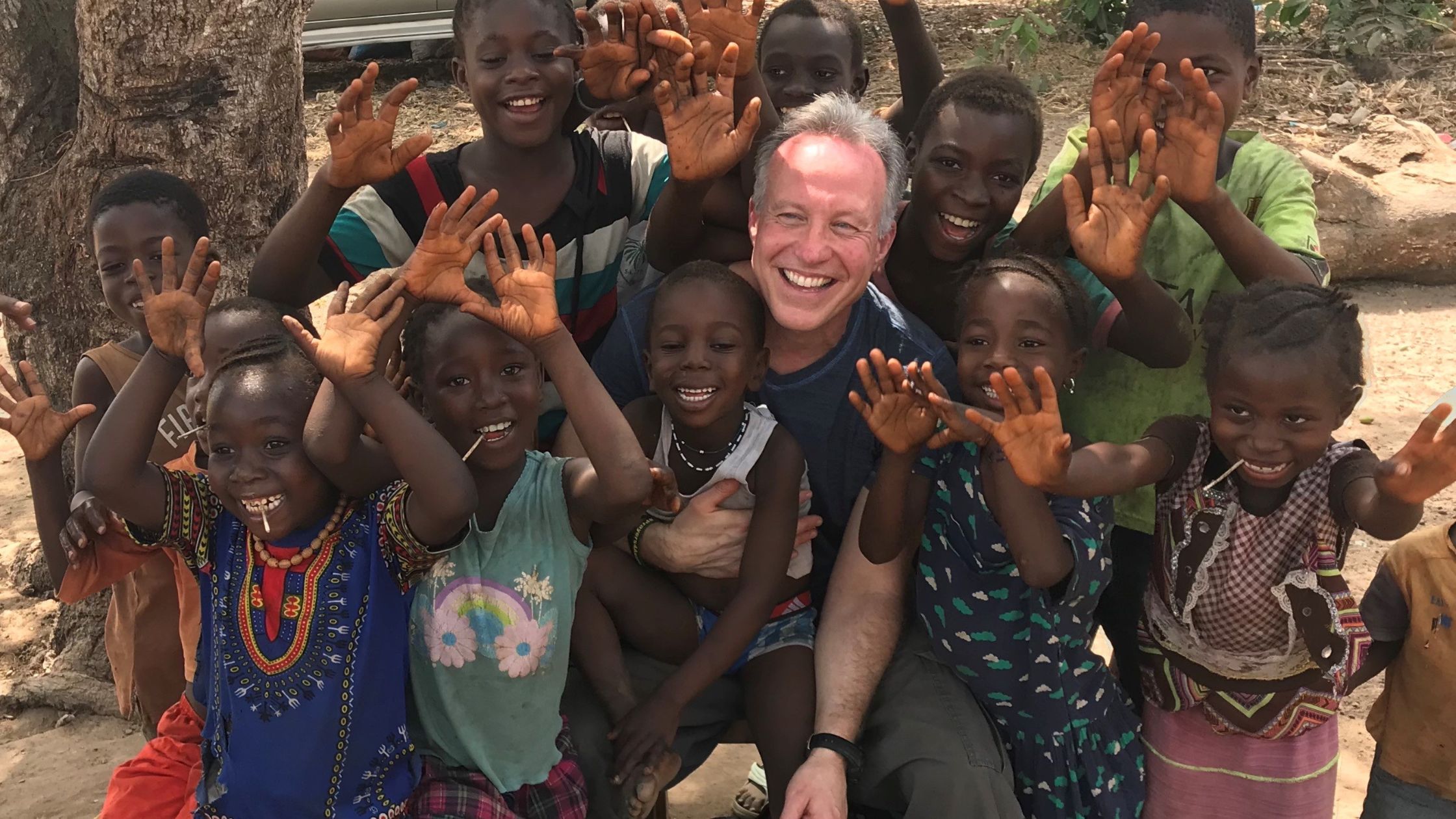 Michele Gething with a group of child in Sierra Leone