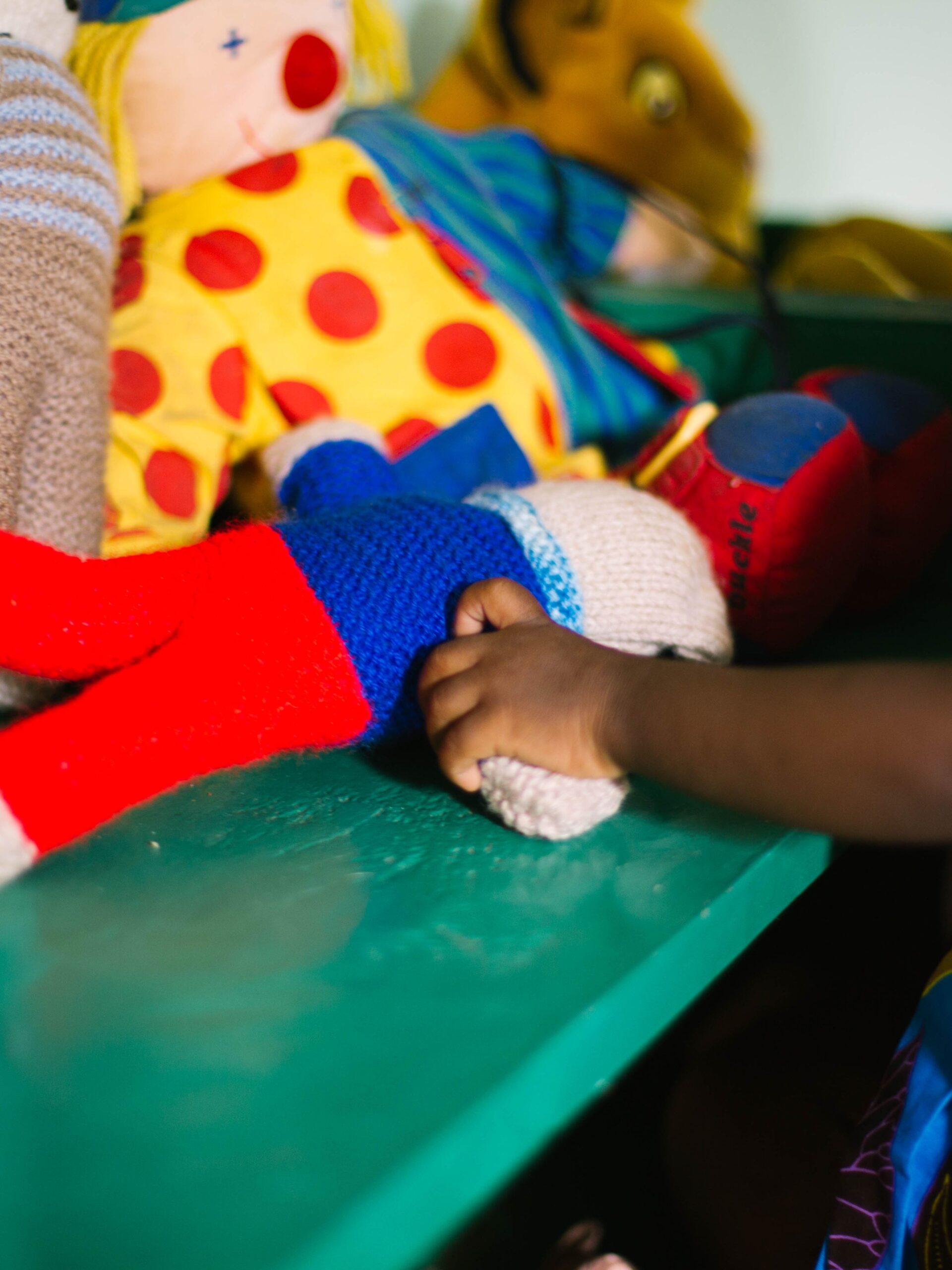 child holding their toy