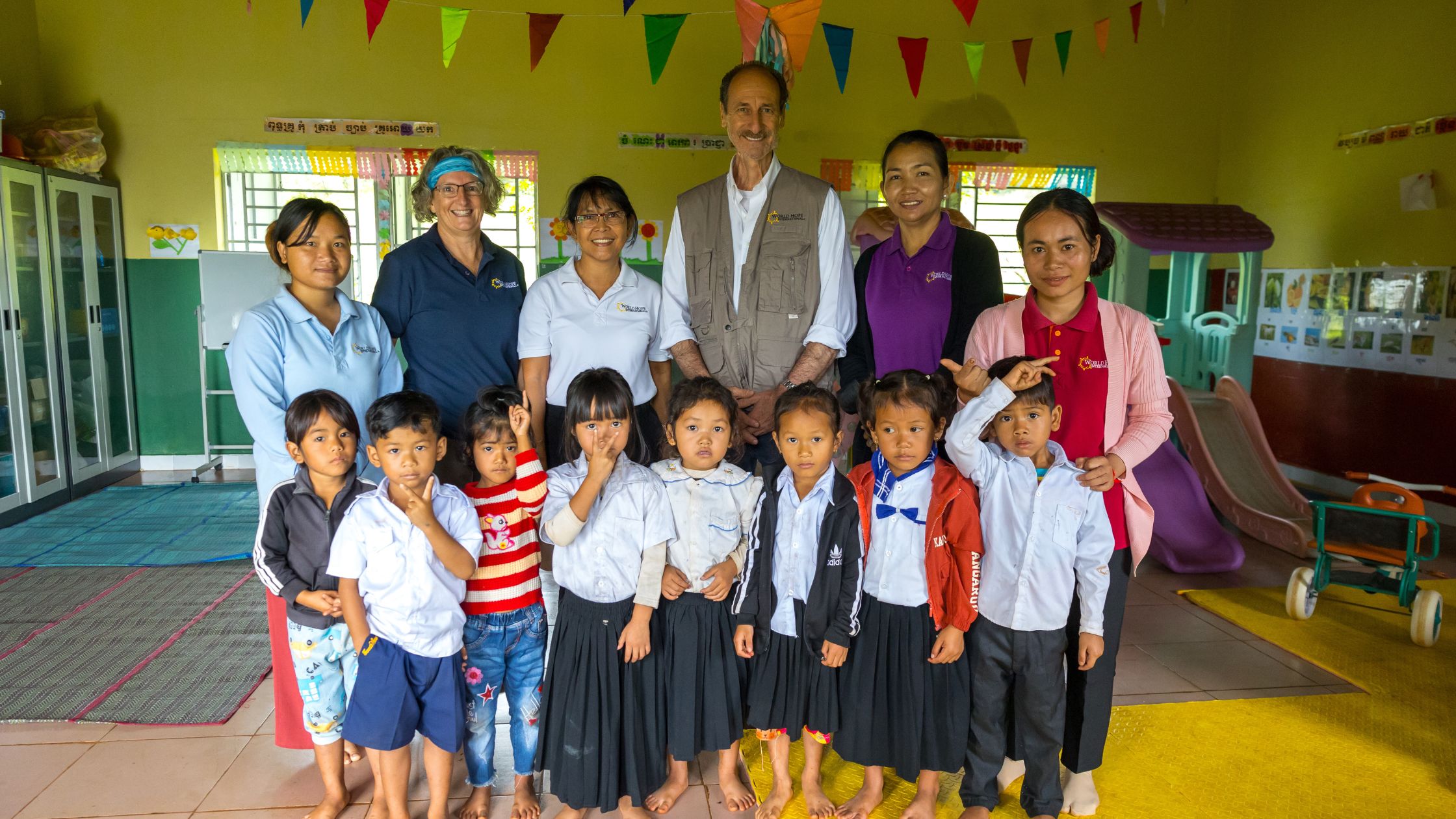 John in Cambodia at school with kids