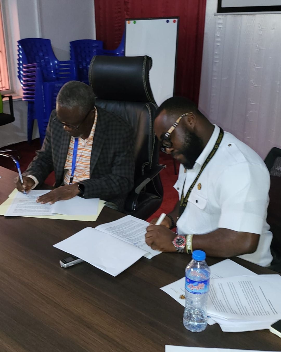 Signing MOU between WHI & NWASH in Liberia Signing MOU between WHI & NWASH in Liberia